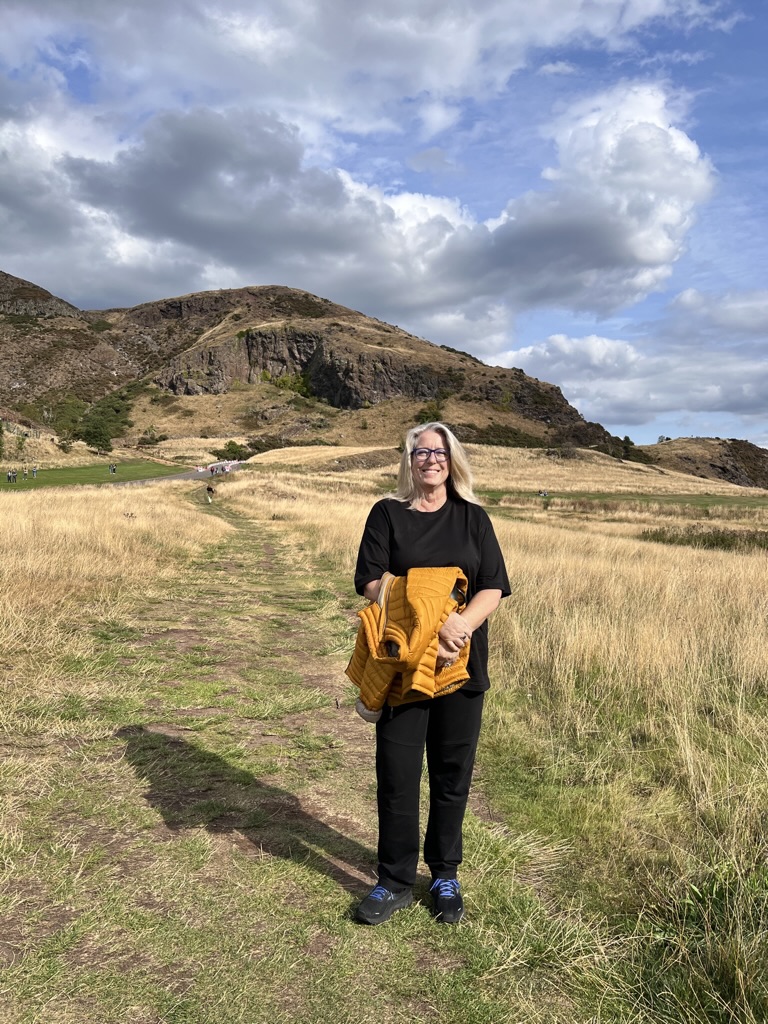 Photo of Reta Hampton, Writer on the path to Arthur's Seat in Edinburgh Scotland