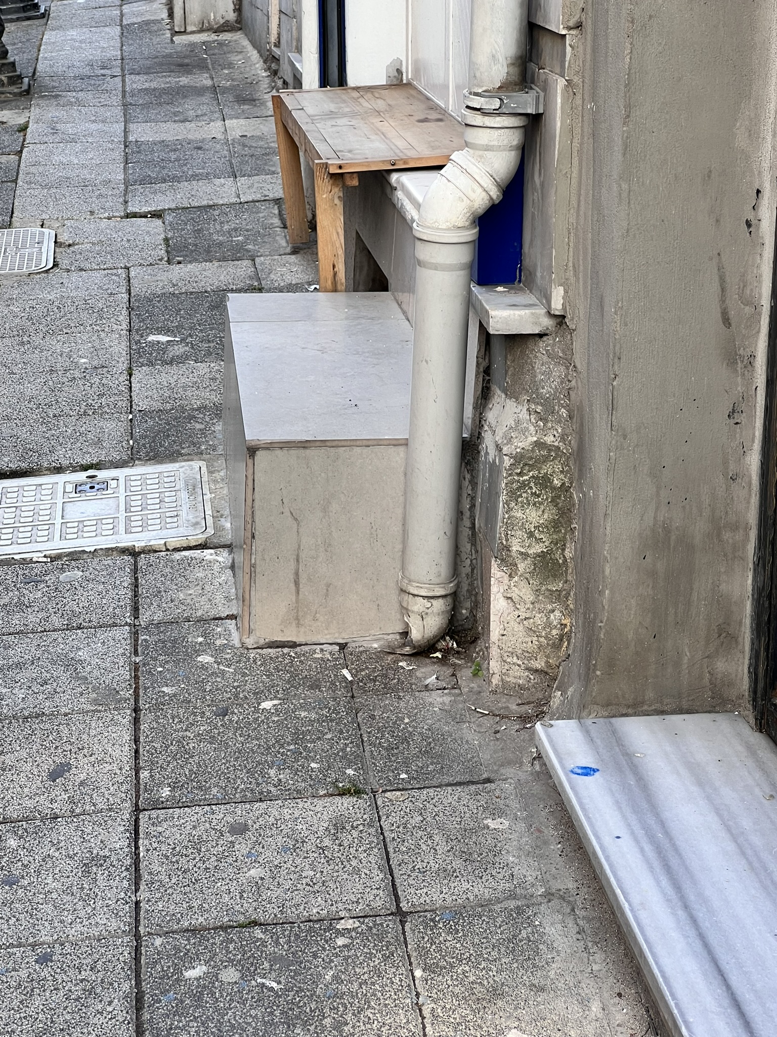 Photo of uneven entrance steps to store in Kadikoy Istanbul Turkey